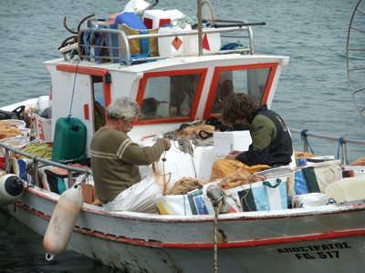 Cypriot fishermen preparing nets