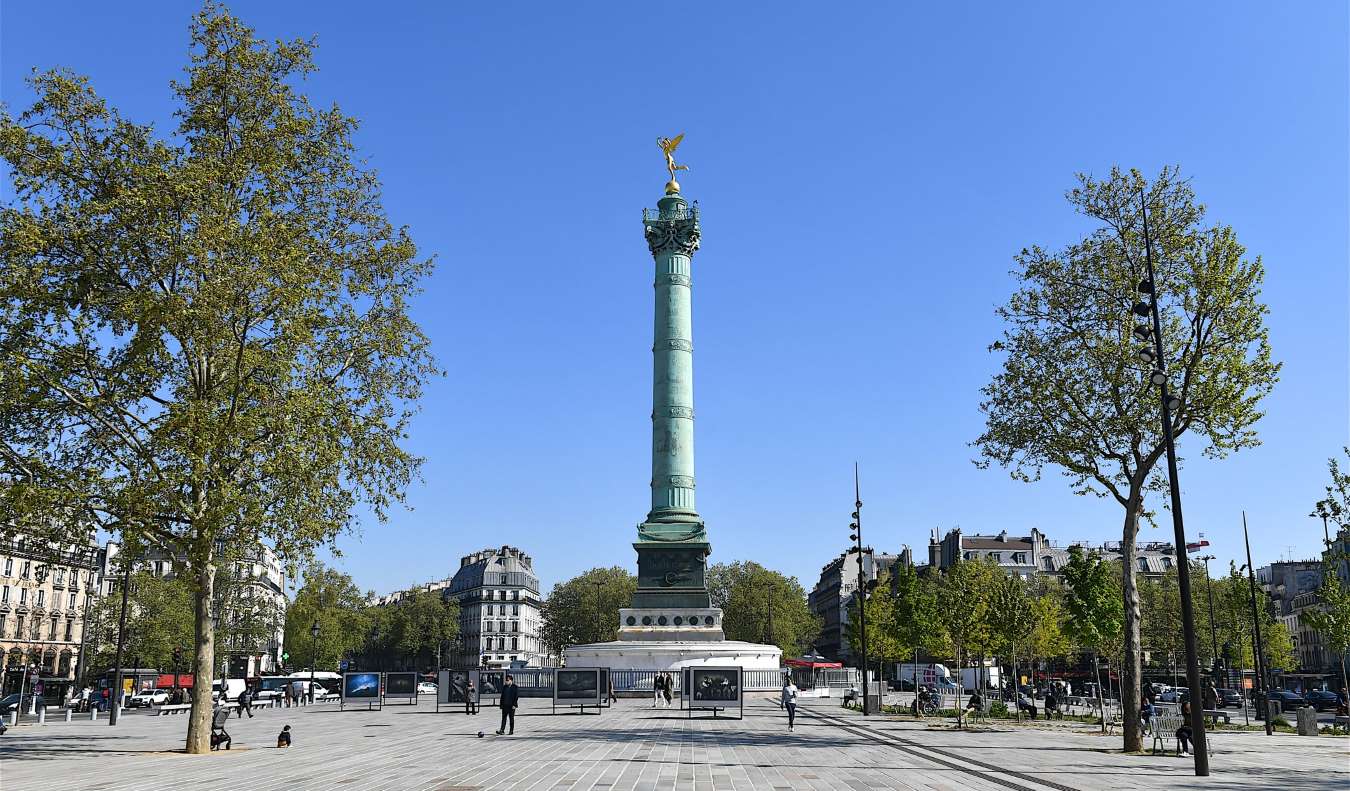 The Place de la Bastille square with the large July Column monument in the center, in Paris, France