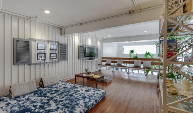 Common area with low seating areas on the floor at Quarter Bangkok Ratchathewi hotel in Bangkok, Thailand