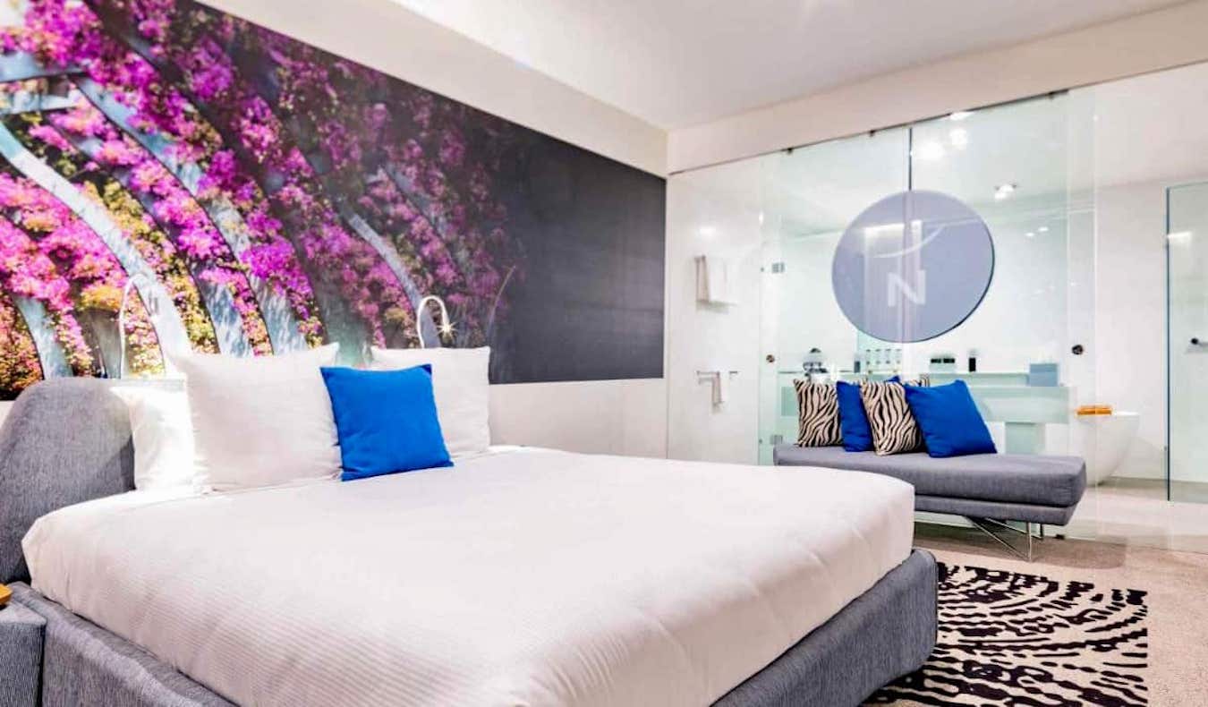 A huge bed in a spacious hotel room at the Novotel hotel in Brisbane, Australia