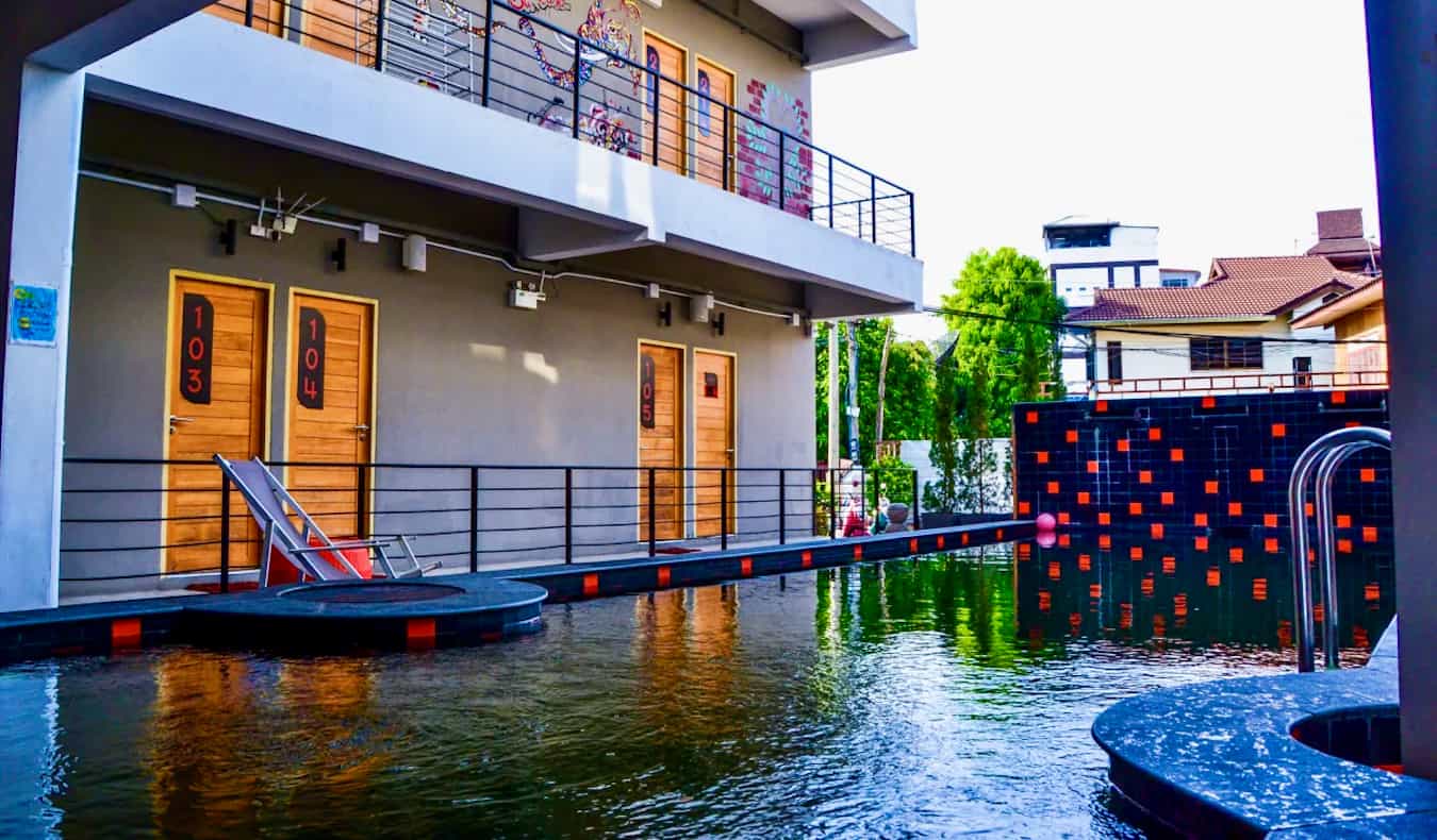 The fun outdoor pool area of the Mad Monkey Hostel in Chiang Mai, Thailand