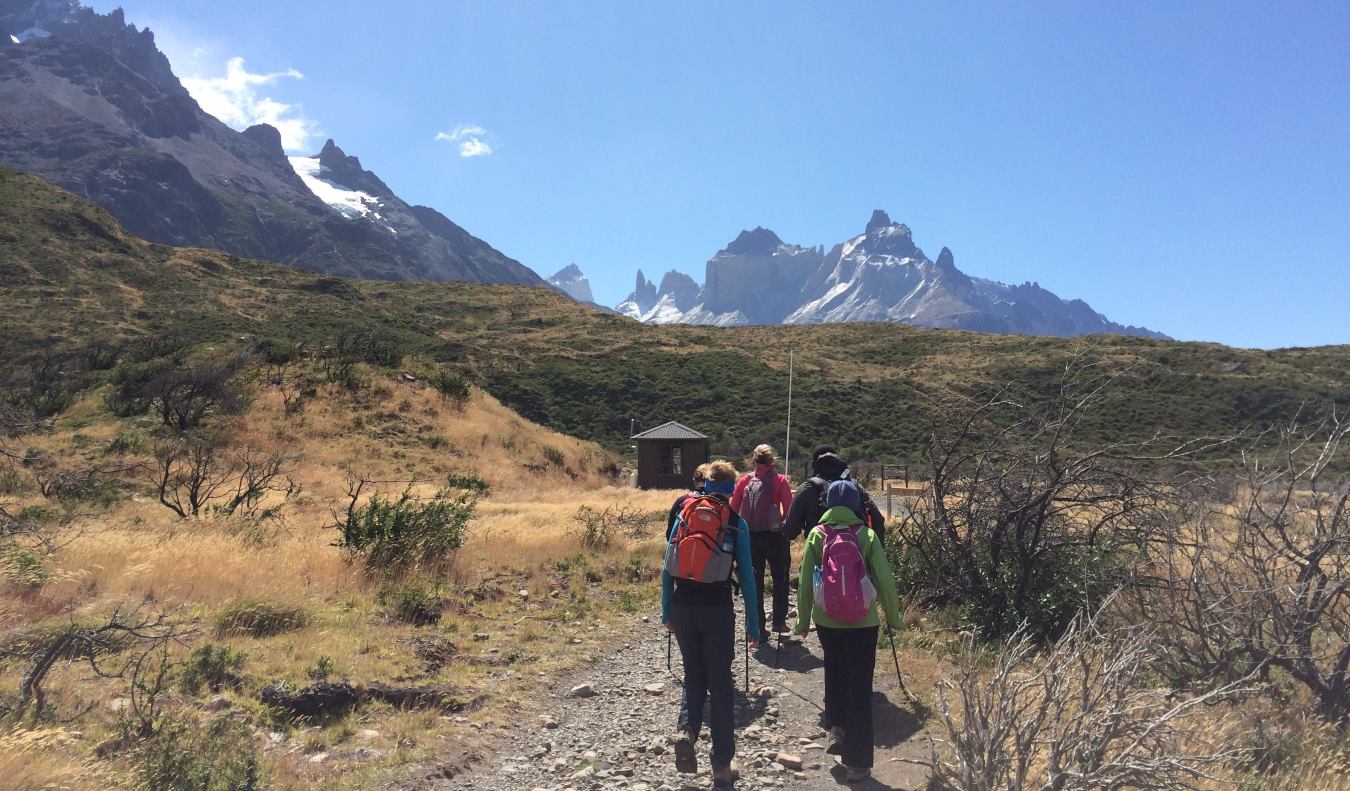 A group of travelers hiking together in Torres del Paine National Park in Chile