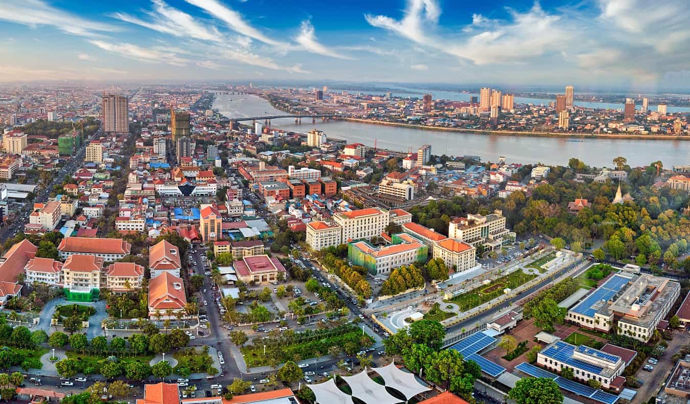 Aerial view over the cityscape of Phnom Penh, Cambodia“/></noscript><br />
The capital of Cambodia, <a href=